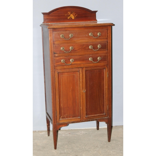 77 - An Edwardian inlaid mahogany music cabinet with 3 drawers over a cupboard, approx 53cm wide