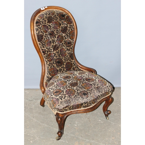 80 - A 19th century mahogany show frame low chair with button upholstery