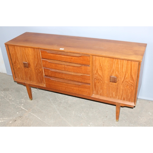 84 - A retro Scandinavian style sideboard with 4 drawers flanked by 2 cupboards, seemingly unnamed, appro... 