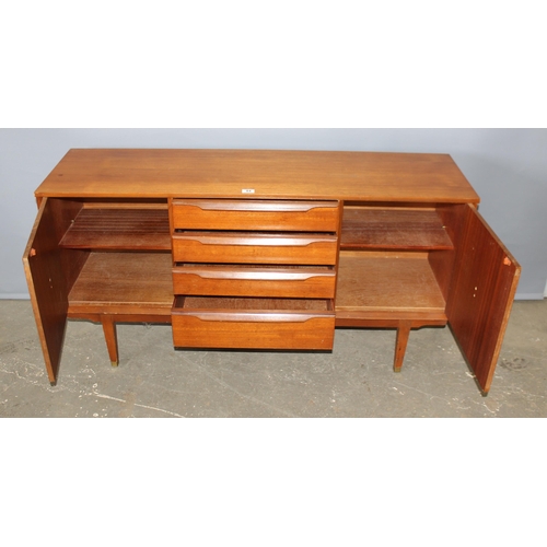 84 - A retro Scandinavian style sideboard with 4 drawers flanked by 2 cupboards, seemingly unnamed, appro... 