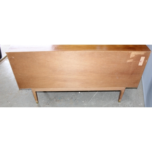 84 - A retro Scandinavian style sideboard with 4 drawers flanked by 2 cupboards, seemingly unnamed, appro... 