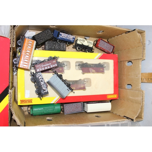 1506 - 2 boxes of assorted model train items to inc rolling stock and buildings/ landscapes etc