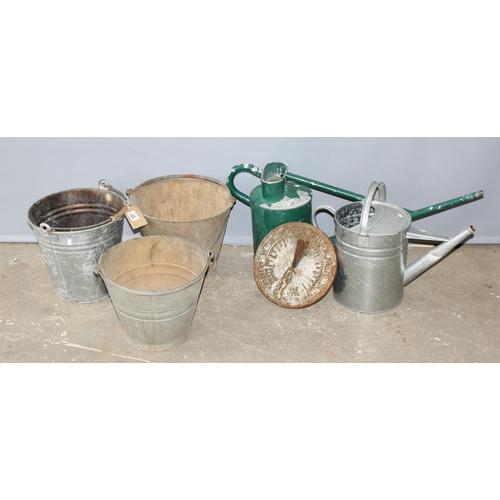 301 - 2 vintage galvanised watering cans, 3 vintage metal buckets and a cast iron sundial