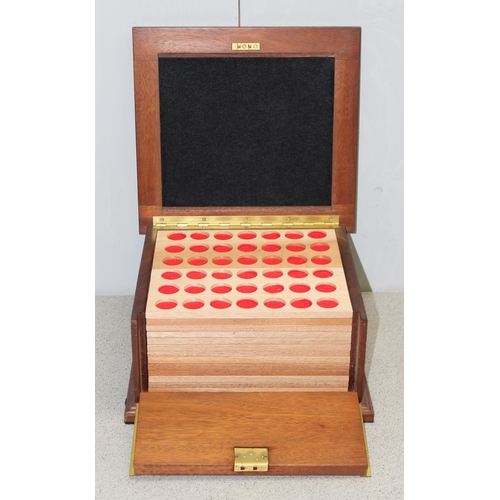 3A - A 20th century oak coin collector's cabinet or box containing 13 removable trays, approx 31cm square