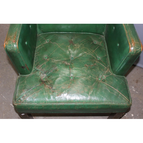 92 - A green leather button back club chair