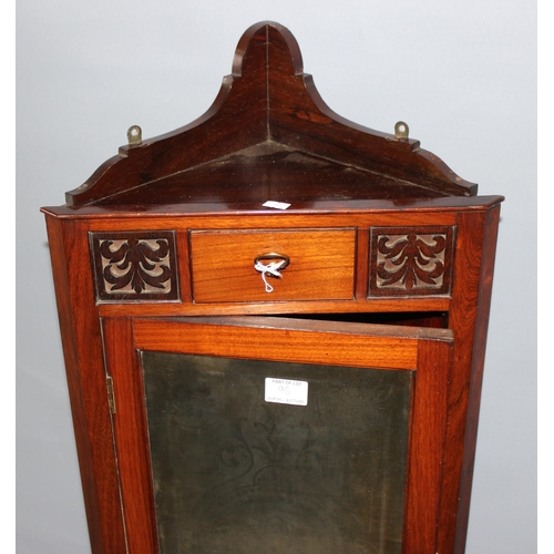 96 - A small antique mahogany pot cupboard, a hanging mahogany corner cupboard with acid etched glazed do... 