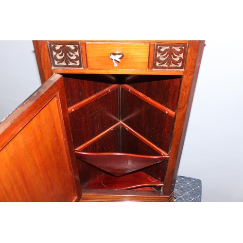 96 - A small antique mahogany pot cupboard, a hanging mahogany corner cupboard with acid etched glazed do... 