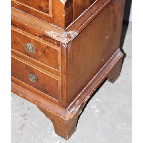 98 - A miniature yew wood effect 2 over 3 and 2 over 1 chest on chest style chest of drawers, approx 39cm... 