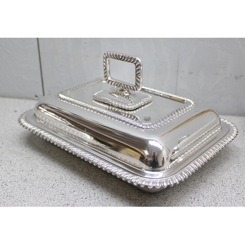 1002 - 3 antique silver plated entrée dishes of rectangular shape with gadrooned borders, one bearing armor... 