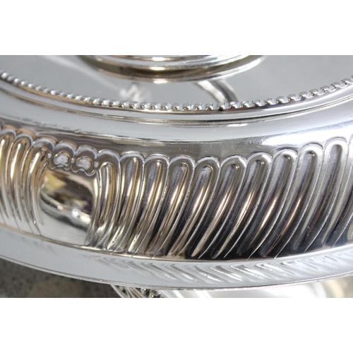 1003 - 2 antique silver plated entrée dishes of oval shape with, the larger approx 29cm wide