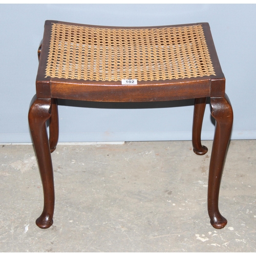 102 - Small wooden bergere seated stool with pad feet