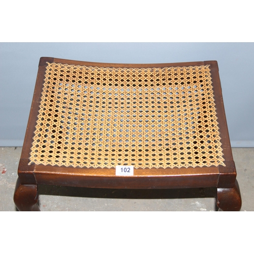 102 - Small wooden bergere seated stool with pad feet