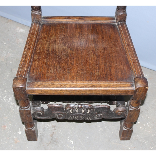 108 - Antique oak 17th century style high back chair with carved detail