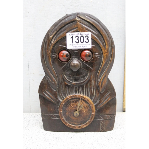 1303 - Vintage novelty Black Forest rolling eye clock