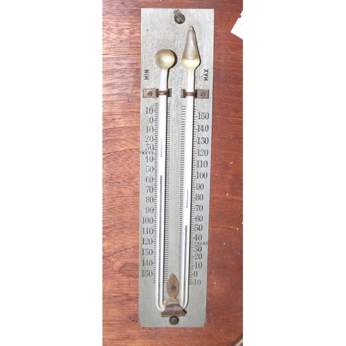 1308 - A vintage combination wall clock, thermometer and barometer by Sestrel, the clock with mechanical mo... 