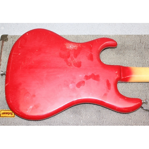 651 - A vintage Watkins Rapier electric guitar with red painted body, in vintage Selmer hardshell guitar c... 