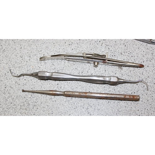 703 - Qty of vintage dentistry tools and a vintage dentistry book