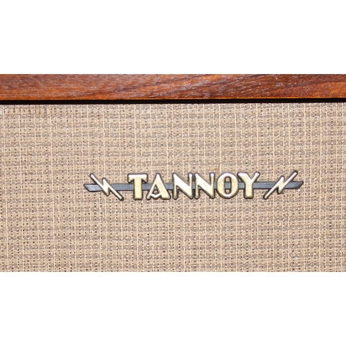 802 - A matched pair of vintage teak cased floor standing Tannoy speakers with applied paper labels to rev... 