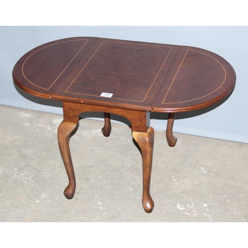 147 - Glassed topped coffee table & a small burr wood effect drop leaf table