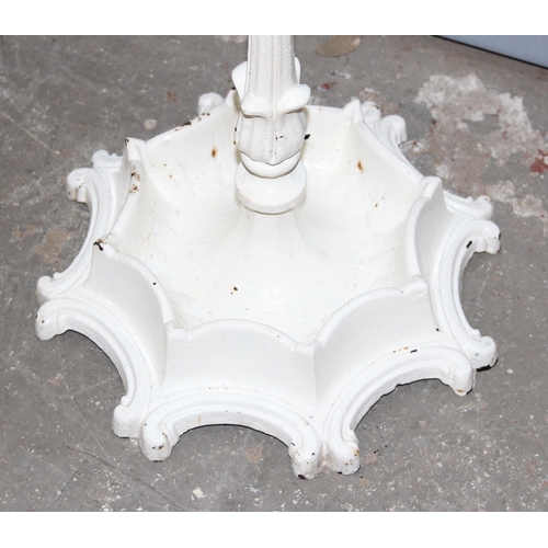 149 - Antique white painted cast iron stick or umbrella stand with integrated drip tray, strongly in the m... 