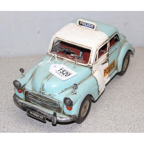 1520 - Large detailed handmade tin ware model of a 1970’s police panda patrol car. approx. 34cm long