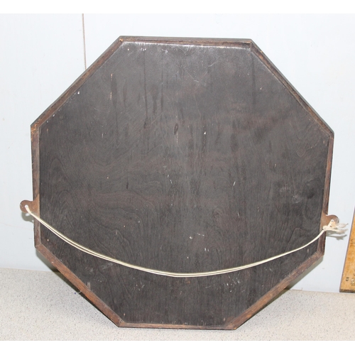 484 - 1920’s oak framed octagonal wall mirror with bevelled glass plate.