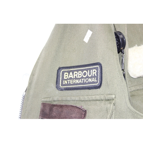 760 - Barbour fly fishing gilet and a vintage canvas & leather fly fishing shoulder bag