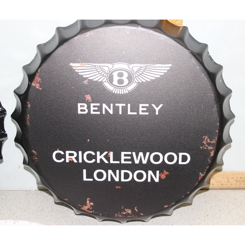 762 - Three large bottle top wall art/man cave signs – Rolls Royce, Bentley, and Aston Martin logos approx... 