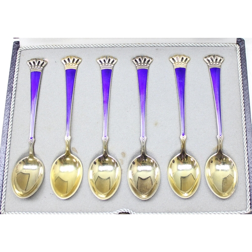 1031 - A boxed set of 6 Danish silver gilt and enamel demitasse spoons, comprising blue enamel with coronet... 