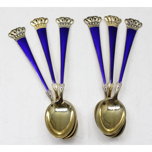 1031 - A boxed set of 6 Danish silver gilt and enamel demitasse spoons, comprising blue enamel with coronet... 