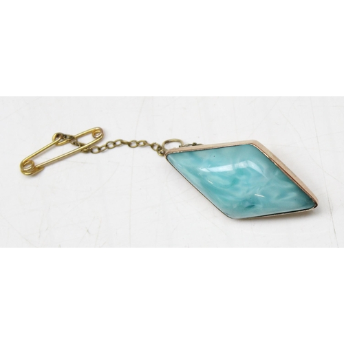 1112 - Diamond shaped 9ct gold brooch set with blue stone, possibly Larimar and safety chain, gross weight ... 