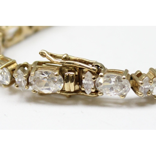 1116 - 9ct gold tennis bracelet set with white stones, approx 15.01g gross, 20cm