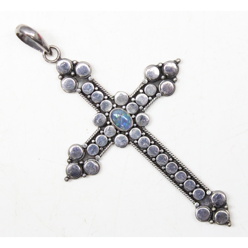 1123 - Large Suarti silver crucifix pendant set with blue opal like stone, approx 8cm long, 12.40g gross