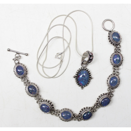 1124 - Matching Suarti silver necklace pendant on chain and bracelet set with blue opal like stones, approx... 