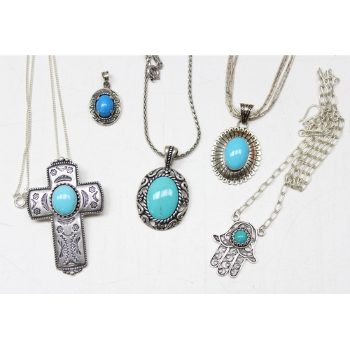 1127 - 5 silver pendants set with turquoise cabochons, 4 with chains, approx 43.88g gross, all marked 925 a... 