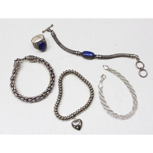 1128 - Small qty silver jewellery to incl 4 bracelets and a ring set with blue stone, approx 100.20g gross,... 