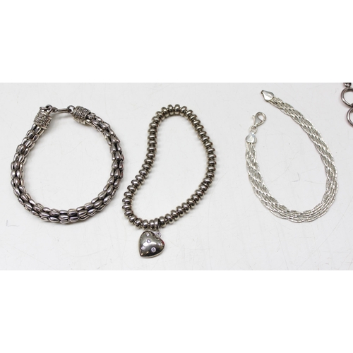 1128 - Small qty silver jewellery to incl 4 bracelets and a ring set with blue stone, approx 100.20g gross,... 