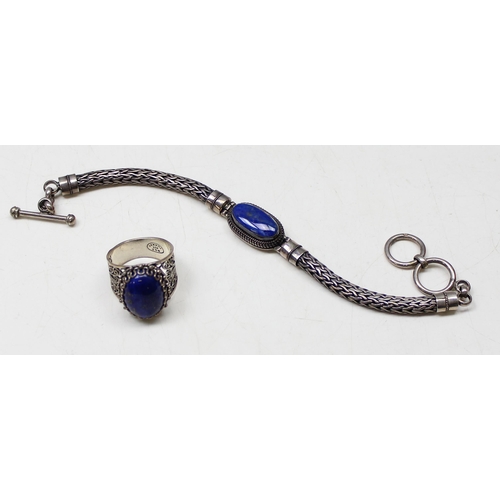 1128 - Small qty silver jewellery to incl 4 bracelets and a ring set with blue stone, approx 100.20g gross,... 