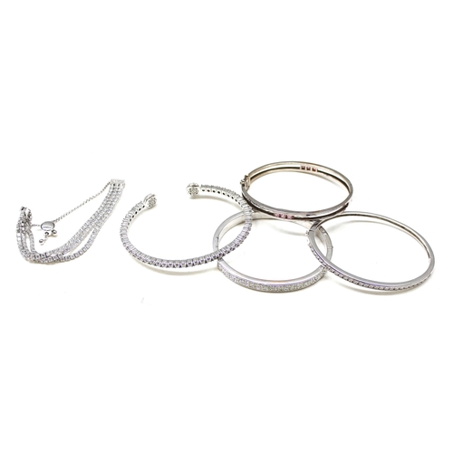 1133 - 8 silver bracelets/bangles all XRF tested 92.5% or above, all set with crystal, gross weight approx ... 