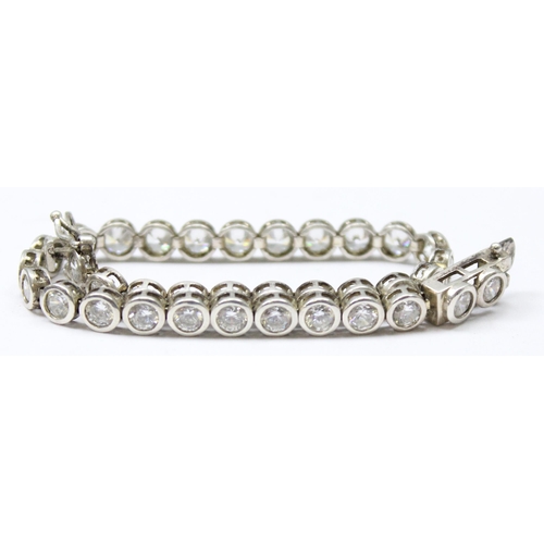 1137 - Silver tennis bracelet set with white stones, gross weight approx 11.37g, 20cm