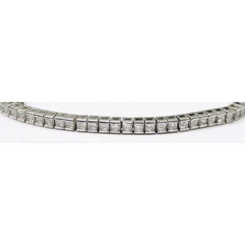 1138 - Silver Diamonique tennis bracelet set with white stones, gross weight approx 12.66g, 22cm