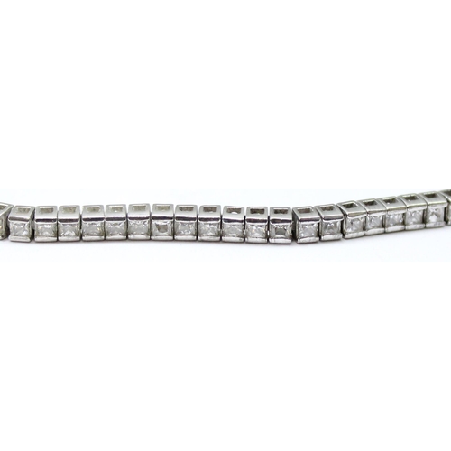 1138 - Silver Diamonique tennis bracelet set with white stones, gross weight approx 12.66g, 22cm