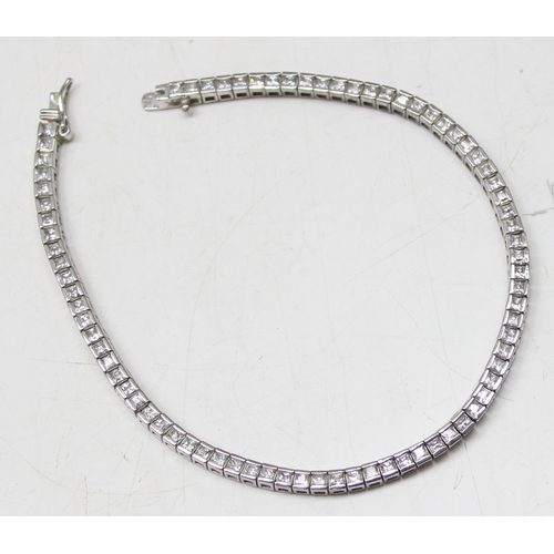 1138 - Silver Diamonique tennis bracelet set with white stones, gross weight approx 12.66g, 22cm