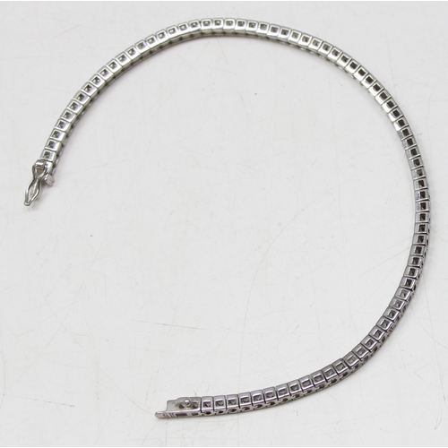 1138 - Silver Diamonique tennis bracelet set with white stones, gross weight approx 12.66g, 22cm