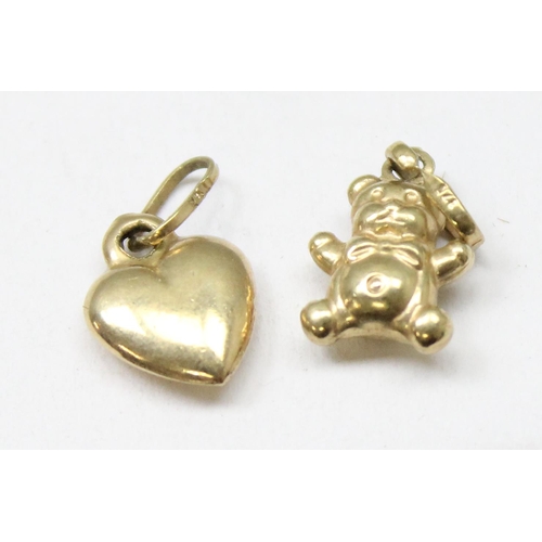 1166 - 2 9ct gold charms, teddy bear and a heart, approx 0.61g gross