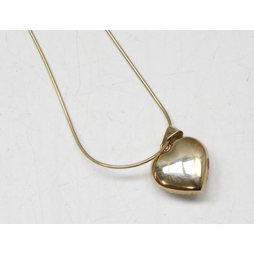 1169 - 9ct gold heart shaped and white stone set pendant on 9ct gold chain, chain approx 44cm long, approx ... 