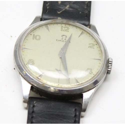 1301 - A 1950's Omega wristwatch in stainless steel case, the dial with baton odd numerals and even Arabic ... 