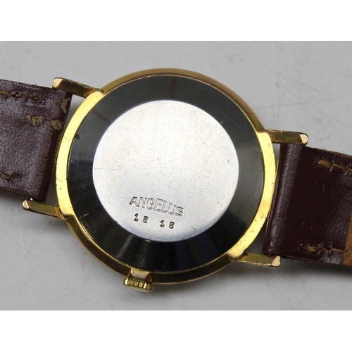 1310 - A vintage Angelus automatic watch with gold plated case, later leather strap