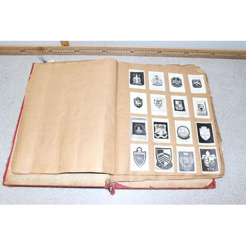 1417 - Antique scrapbook and contents, mainly military crests