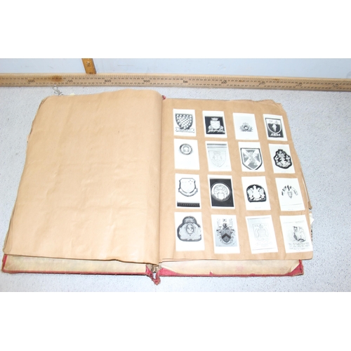 1417 - Antique scrapbook and contents, mainly military crests